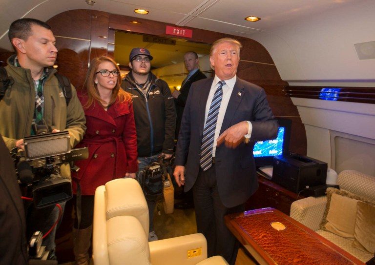 After a shaky start, which his campaign later attributed to the unreliable wi-fi on his private jet, Trump fielded questions from supporters and skeptics. (AP Photo/Nati Harnik)