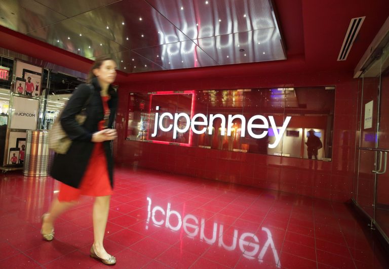 FILE - In this April 9, 2013 file photo, a customer leaves a JC Penney store in New York. JC Penney reports quarterly financial results after the market closes on Thursday, May 15, 2014. (AP Photo/Mark Lennihan, File)