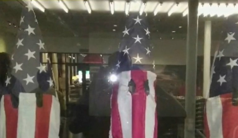 The controversial artwork is on display until Nov. 12 at the University of Miami's annual faculty art show. (Image courtesy screenshot)