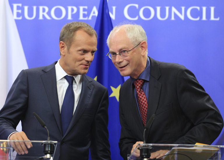 FILE- In this Sept.12, 2011 file photo  European Council President Herman Van Rompuy, right, and Poland's Prime Minister Donald Tusk address the media, at the European Council building in Brussels. Tusk was chosen by European leaders to be the next president of the European Council.  European Union nations were looking at sporting sanctions to punish Russia for its involvement in the Ukraine crisis but diplomats said Wednesday Sept.3, 2014 the immediate targeting of high-profile events like the 2018 World Cup is unlikely at this stage.  (AP Photo/Yves Logghe,file)