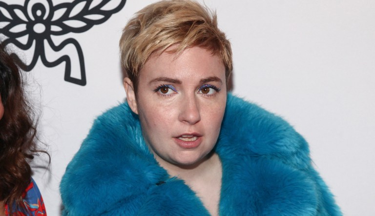 Lena Dunham says she warned Hillary Clinton's campaign about Harvey Weinstein in March 2016. (Photo by Andy Kropa/Invision/AP)
