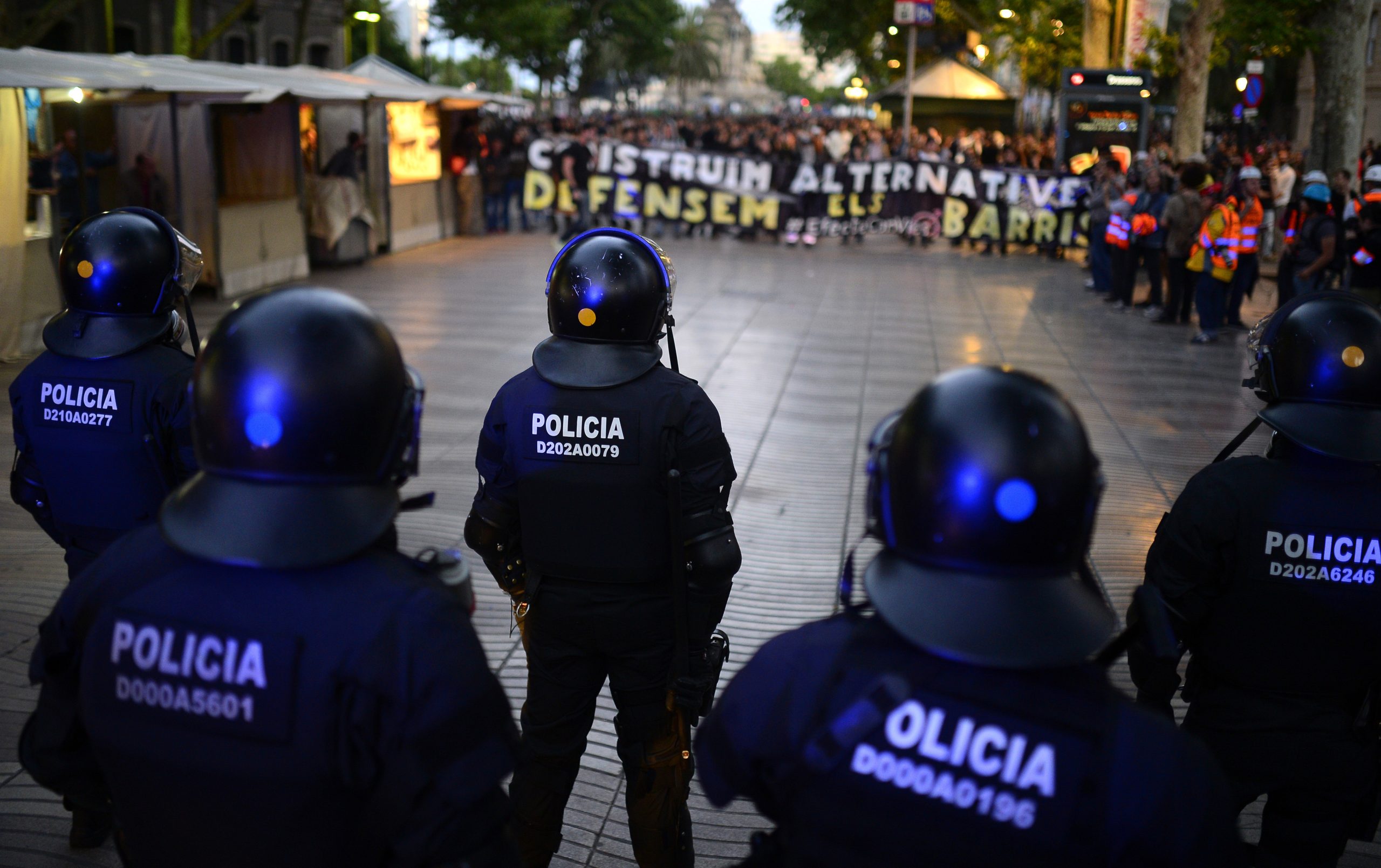 7 arrests as hooded youths clash with Spain police