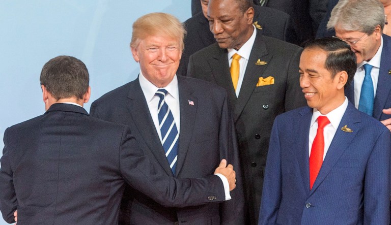 President Trump and French President Emmanuel Macron, embracing last week at the G20 summit, will mark their countries' 100th anniversary of involvement in World War I during Bastille Day ceremonies. Their relationship got off to a cold start but may be warming up.