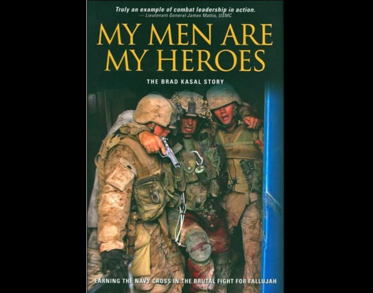 A former Marine who was famously photographed carrying a wounded comrade from Fallujah's 