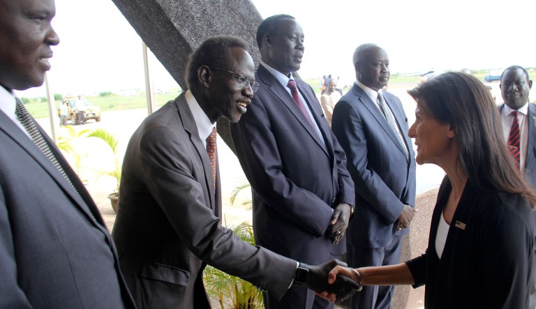 US Ambassador to the United Nations Nikki Haley, right, meets South Sudanese officials on her arrival in Juba, South Sudan, Wednesday, Oct.25, 2017. The U.S. ambassador to the United Nations, Nikki Haley, has been evacuated from a U.N. camp for displaced people in South Sudan because of a volatile demonstration against President Salva Kiir. An aid worker at the camp says U.N. security guards fired tear gas to disperse the crowd of more than 100 people shortly after Haley left. The ambassador, on a three-country Africa visit, met earlier with Kiir over the country's long civil war. (AP Photo)