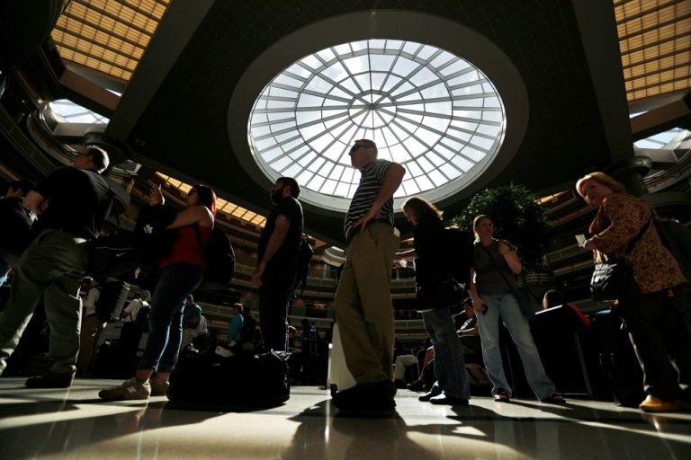 Speeding up passenger processing by the Transportation Security Administration would reduce the danger by reducing the crowds. (AP Photo)