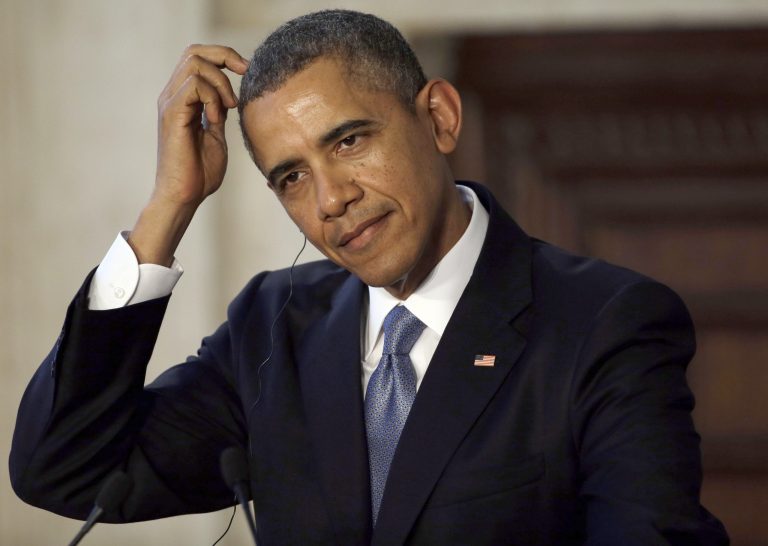 President Obama answers reporters' questions during a joint press conference with Italian Premier Matteo Renzi at Rome's Villa Madama on Thursday. (AP Photo/Gregorio Borgia)