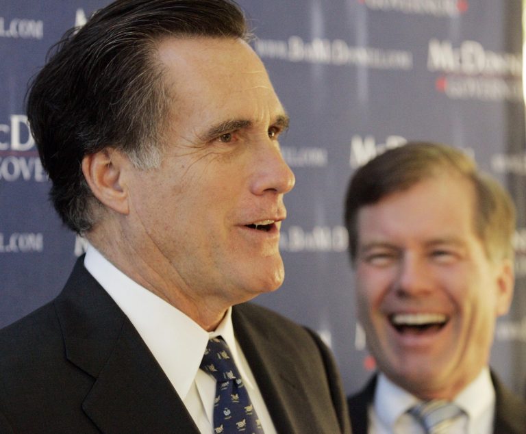 Then-Virginia GOP gubernatorial hopeful Bob McDonnell, right, reacts during a campaign speech by former Mass. Gov. Mitt Romney during a campaign stop at the Richmond Airport in Richmond, Va., Wednesday, Oct. 28, 2009. (AP Photo/The Richmond Times-Dispatch, Joe Mahoney)