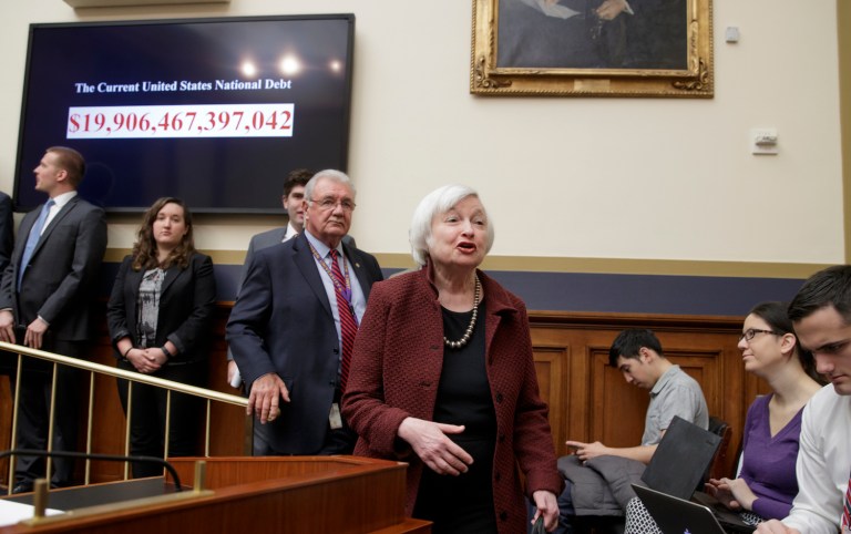 Fed officials projected that they would raise interest rates by a quarter-percentage point three times in 2017. (AP Photo/J. Scott Applewhite)