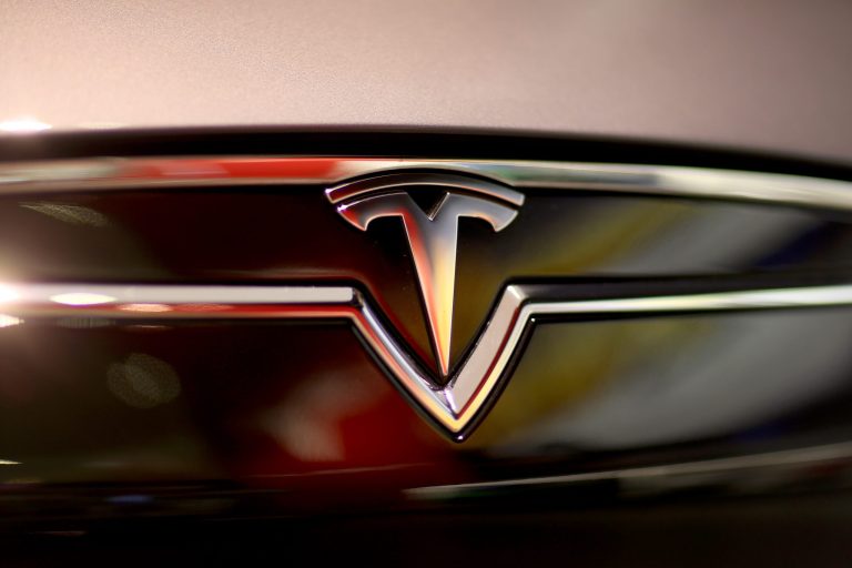 Tesla Motors, the electric-car maker that has seen its stock advance more than sevenfold in the past year, will spend as much as $5 billion on a new battery factory so it can make more affordable cars.  (Photo by Joe Raedle/Getty Images)