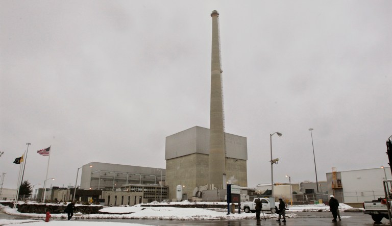 This 2010 picture shows the large square building that houses the nuclear reactor at the Oyster Creek nuclear plant in Lacey Township, N.J. The facility was scheduled to close on December 2019, but now the plant will shut down ahead of schedule in October. (AP Photo/Mel Evans)
