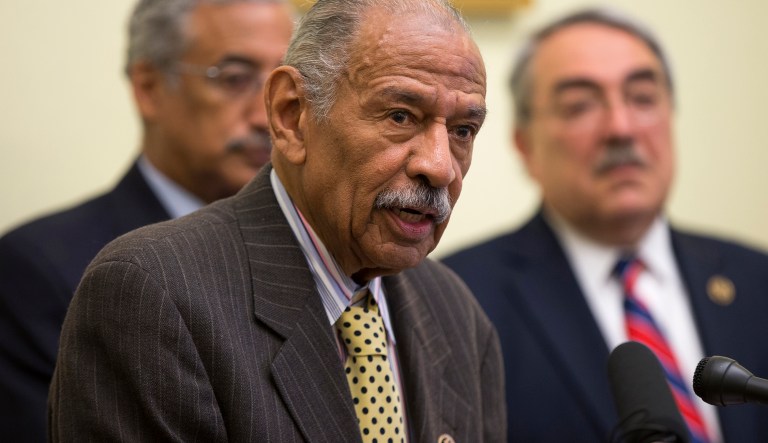 Rep. John Conyers reportedly settled a wrongful dismissal case in 2015 after a former female staffer said she was fired for rejecting the congressman's sexual advances. (AP Photo/Evan Vucci)