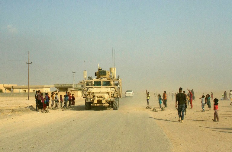 AU.S. Army Mine-Resistant Ambush Protected vehicle travels in northern Iraq. U.S. troops will be engaged more closely than ever in fighting against Islamic State group militants as they back Iraqi forces in the long-anticipated assault on Mosul. (AP Photo/Susannah George)