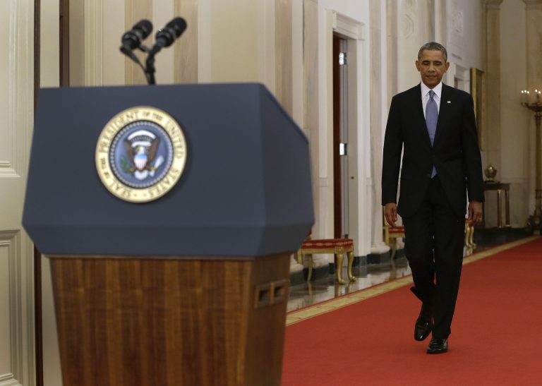 President Obama walks to the podium before addressing the nation in a live televised speech from the East Room of the White House in Washington on Tuesday. (AP/Evan Vucci)