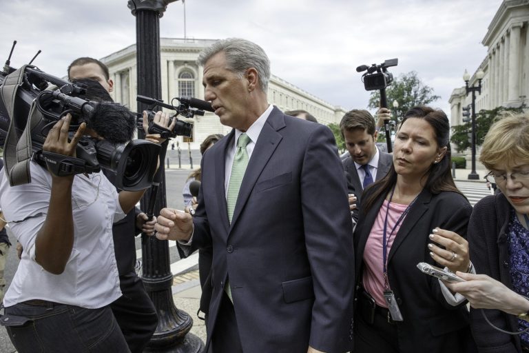 House Majority Whip Kevin McCarthy, R-Calif., is followed by reporters as he crosses Independence Ave. just after being elected the new majority leader by the Republican Conference, replacing Rep. Eric Cantor, R-Va., who was defeated in his primary earlier this month, on Capitol Hill in Washington, Thursday, June 19, 2014.  Conservative Rep. Steve Scalise, R-La., is taking McCarthy's place as GOP whip. (AP Photo/J. Scott Applewhite)