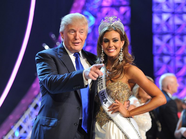 In this June 16, 2013 file photo, Donald Trump, left, and Erin Brady,Â Miss Connecticut,Â pose onstage after Brady won the 2013 Miss USA pageant in Las Vegas. (AP)