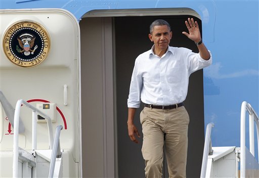 President Barack Obama waves as he arrives in Kenner, La., on Monday. (AP Photo)