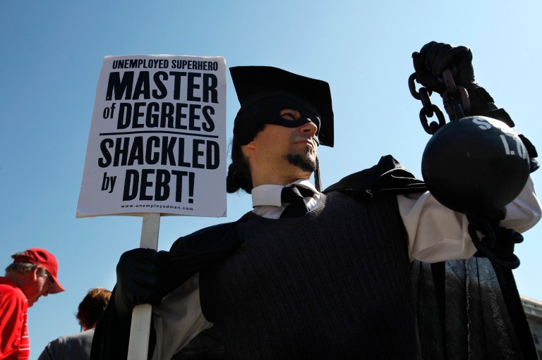 Mounting student debt burdens is not keeping young people from buying houses, according to a new study (AP Photo/Jacquelyn Martin, File)