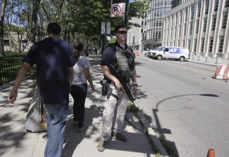 An armed U.S. Marshal stands guard outside the Federal Courthouse in Brooklyn, N.Y., Friday, Sept. 9, 2011. New York City resident Agron Hasbajrami, in an indictment unsealed in Brooklyn, has been charged with providing material support to a terrorist organization by plotting to travel to Pakistan to join a radical fighting group. (AP Photo/Richard Drew)