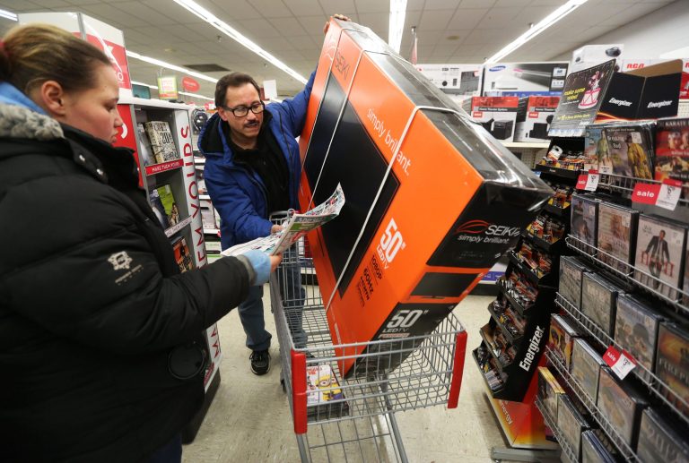 Black Friday shoppers are looking forward to cheap deals on gifts this week, but sales taxes will still apply in the 47 states that levy them. (AP Photo)