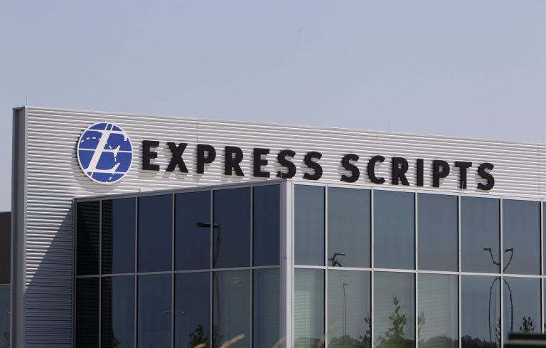 FILE - This July 21, 2011, file photo shows a building on the Express Scripts campus in Berkeley, Mo. Express Scripts Holding Co. reports quarterly financial results after the market closes on Thursday, Feb. 20, 2014. (AP Photo/Jeff Roberson, File)