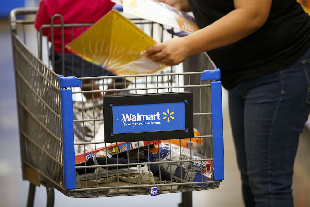 Walmart pours $2 billion tax windfall into e-commerce, pay raises