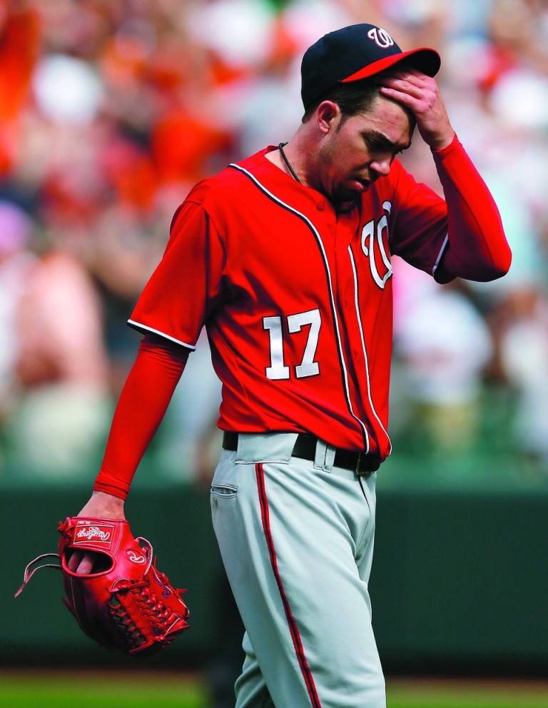 Patrick Semansky/Ap
Nationals relief pitcher Sean Burnett allowed a two-run home run to Matt Wieters in the eighth.
