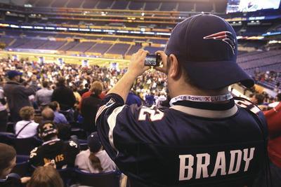 Scott Halleran/Getty Images
Patriots and Giants fans attended Tuesday's media day ahead of Super Bowl XLVI.