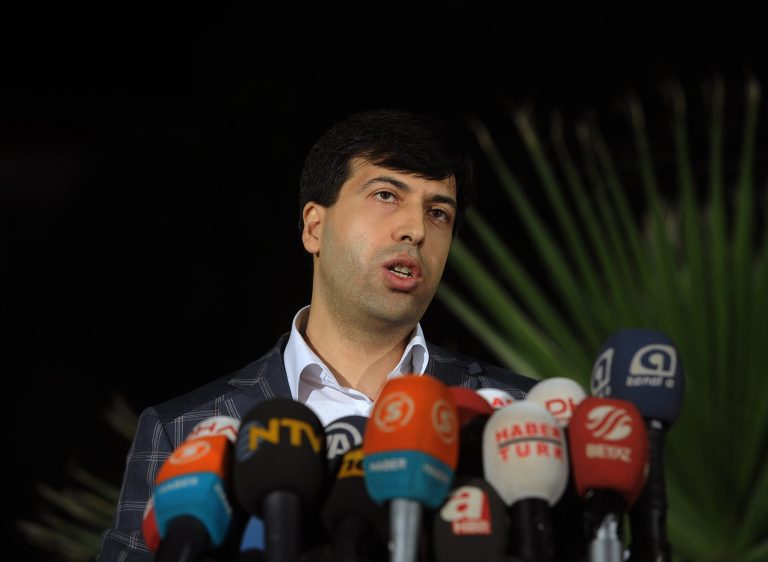 Chief prosecutor Bekir Sahiner speaks to the media in the coal miners' town of Soma, Turkey, Sunday, May 18, 2014. Twenty-five people, including mining company executives, have been detained as Turkish officials investigate the mining disaster that killed 301 people, a domestic news agency reported Sunday.(AP Photo/Emre Tazegul)