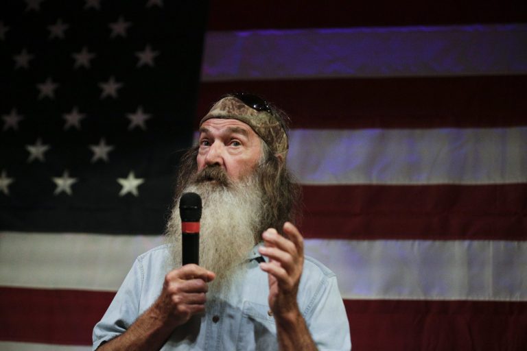 Phil Robertson of Duck Dynasty speaks at a rally for U.S. Senate hopeful Roy Moore, Monday, Sept. 25, 2017, in Fairhope, Ala. (AP Photo/Brynn Anderson)