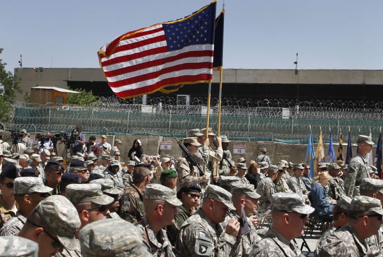 U.S. soldiers gather for a ceremony marking the Memorial Day at the main U.S. base in Bagram north of Kabul, Afghanistan, Monday, May 31, 2010. (AP Photo/Musadeq Sadeq)