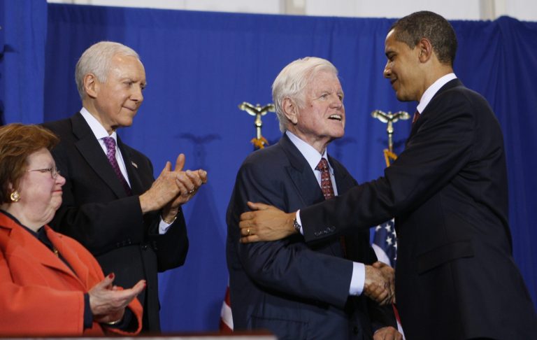 President Barack Obama embraces Sen. Edward Kennedy, D-Mass., as bill co-sponsor Orrin Hatch, R-Utah, second left, and Sen. Barbara Mikulski, D-Md., watch before Obama signs the Edward M. Kennedy Serve America Act at the SEED School of Washington, a public boarding school that serves inner-city students facing problems in both the classroom and at home, in Washington, Tuesday, April 21, 2009. (AP Photo/Charles Dharapak)
