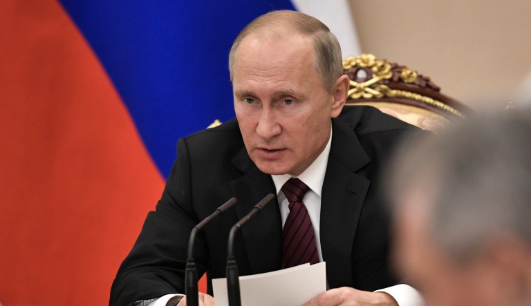 Putin appeared to be accusing the U.S. of ginning up problems for Russian athletes at the World Anti-Doping Agency just before the 2018 Winter Olympics. (Alexei Nikolsky, Sputnik, Kremlin Pool Photo via AP)