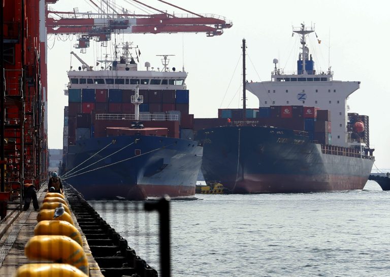 Container ships are moored at the pier of a container terminal in Tokyo, Thursday, Feb. 20, 2014. Japan's trade deficit surged to a monthly record of 2.8 trillion yen ($27.4 billion) in January as imports jumped 25 percent, underscoring the challenge the country faces in restoring export-driven growth. (AP Photo/Shizuo Kambayashi)