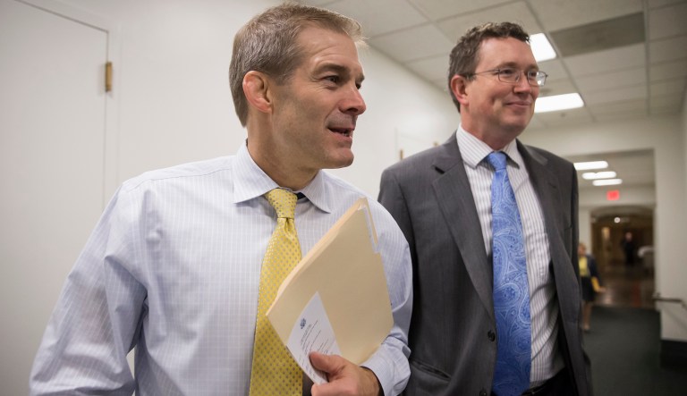 Rep. Jim Jordan, R-Ohio, chairman of the House Freedom Caucus, and Rep. Thomas Massie, R-Ky., walk to a GOP strategy session. Massie, who is close with the Freedom Caucus despite not being a formal member, has proposed for three years in a row an amendment to Section 702 to prohibit warrantless searches of government databases for information on U.S. citizens. (AP Photo/J. Scott Applewhite)