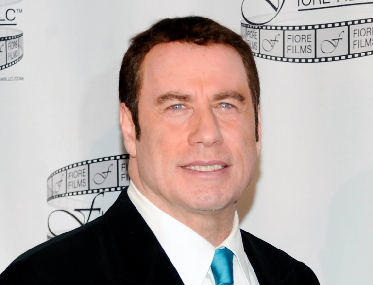   FILE - In this April 12, 2011 file photo, actor John Travolta participates in a news conference for the film 