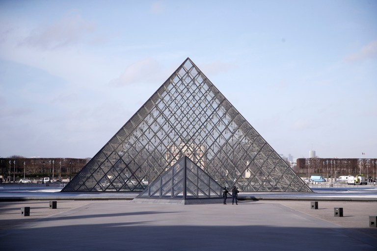 Paris police say a soldier has opened fire outside the Louvre Museum after he was attacked by someone, and the area is being evacuated. (AP Photo/Thibault Camus)