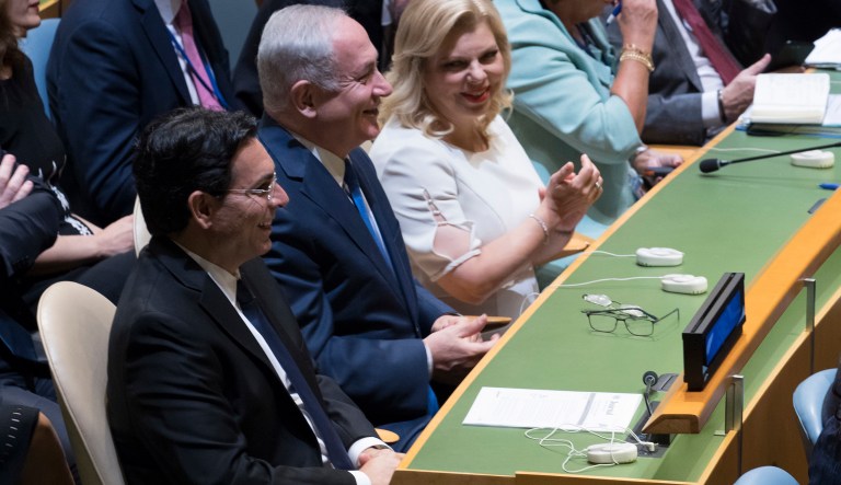 Israeli Prime Minister Benjamin Netanyahu, center, and his wife Sara Netanyahu, right, and Ambassador to the United Nations Danny Danon listen as U.S. President Donald Trump speaks during the 72nd session of the United Nations General Assembly at U.N. headquarters, Tuesday, Sept. 19, 2017. (AP Photo/Mary Altaffer)