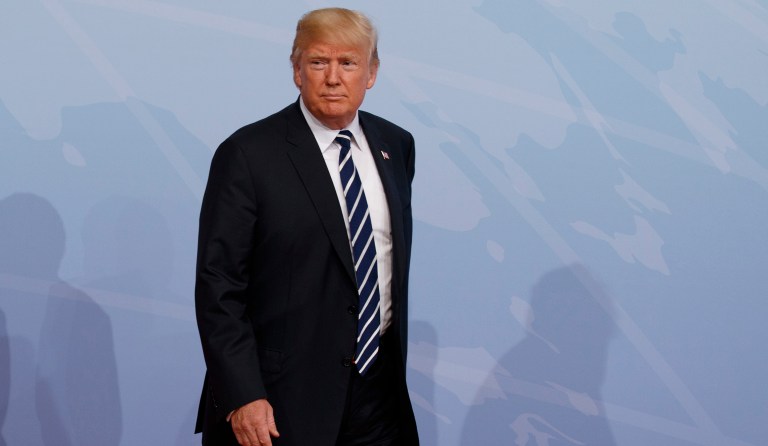 The White House began the first of a series of meetings Thursday that will lead to the reshaping of the Trump administration's climate change goals and policy. (AP Photo/Evan Vucci)