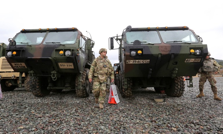 U.S. Marine soldiers walk around military vehicle in the U.S.-South Korea joint Exercise Operation Pacific Reach in Pohang, South Korea, Tuesday, April 11, 2017. (AP Photo/Ahn Young-joon)