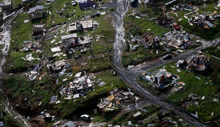 Debris scatters a destroyed community in the aftermath of Hurricane Maria in Puerto Rico. FCC Chairman Ajit Pai was in Puerto Rico to assessed the recovery efforts in response to the hurricane. (AP Photo/Gerald Herbert, File)