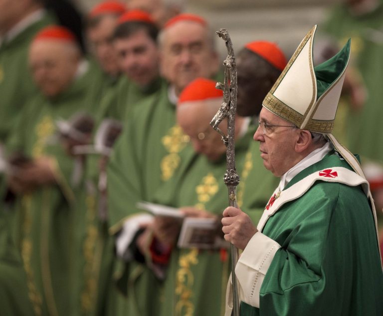 Pope Francis arrives to celebrate a mass in St. Peter's Basilica at the Vatican, Sunday, Feb. 23, 2014. Pope Francis elevated 19 new cardinals Saturday,  from some of the world's smallest, most remote and poverty-wracked nations to help him run the Catholic Church. (AP Photo/Alessandra Tarantino)