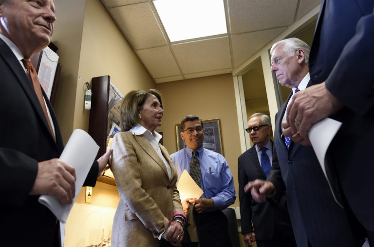 Gathering before a news conference on Capitol Hill in Washington, Thursday, June 25, 2015, from left, Senate Minority Whip Richard Durbin of Ill., House Minority Leader Nancy Pelosi of Calif., Rep. Xavier Becerra, D-Calif., Senate Minority Leader Harry Reid of Nev., and House Minority Whip Steny Hoyer, D-Md., talk on Capitol Hill in Washington, Thursday, June 25, 2015. (AP Photo/Susan Walsh)