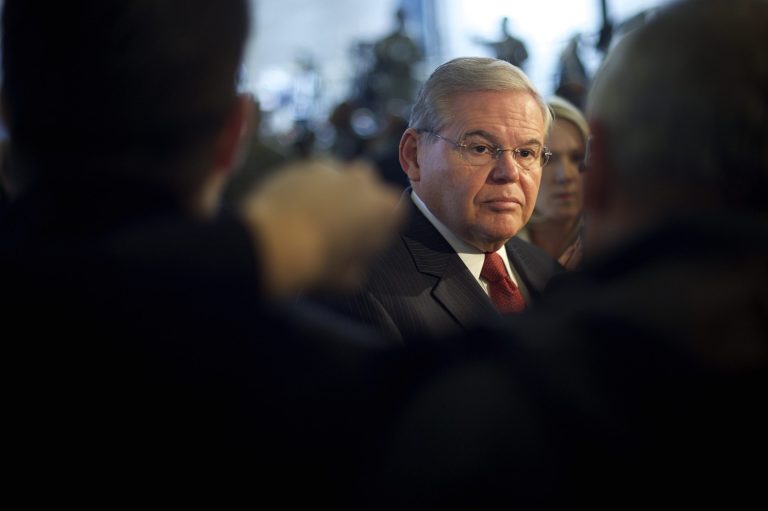 Sen. Senator Robert Menendez addresses the media in advance of an event with President Obama Dec. 15, 2014, at Joint Base McGuire-Dix-Lakehurst, N.J. (Photo by Mark Makela/Getty images)