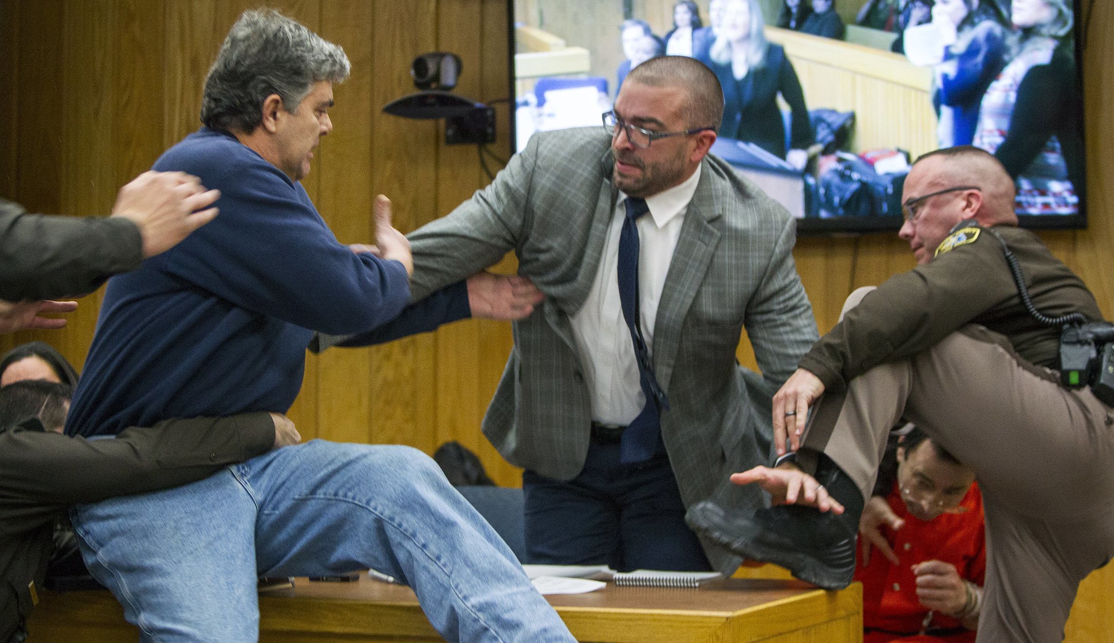 Father of three molested daughters charges former sports doctor Larry Nassar in court