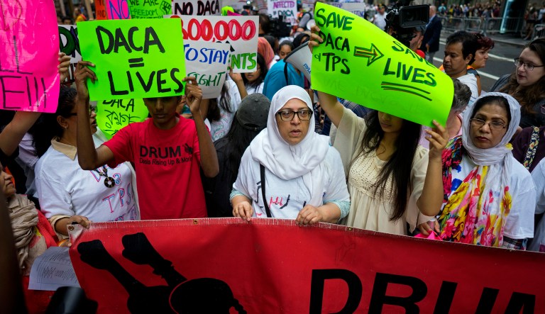 The nine people were taken into custody for civil disobedience in the moments after Attorney General Jeff Sessions announced DACA would be concluded March 5, 2018, if Congress does not act to save it. (AP Photo/Craig Ruttle)