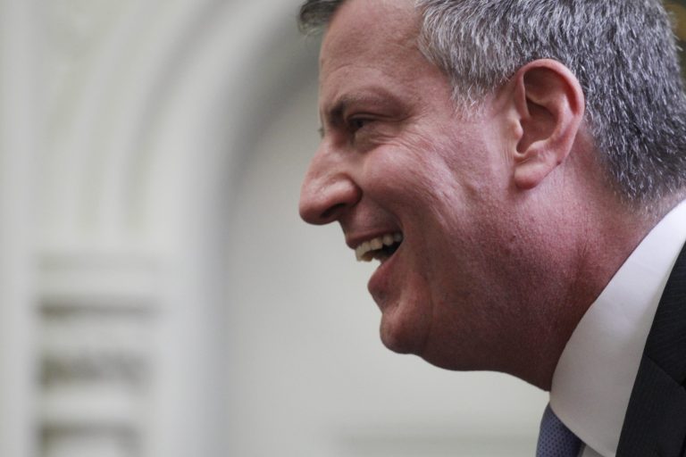 New York City Mayor-elect Bill de Blasio introduces his transition team on Wednesday. De Blasio defeated Republican opponent Joseph Lhota in a landslide. (AP Photo/Mark Lennihan)