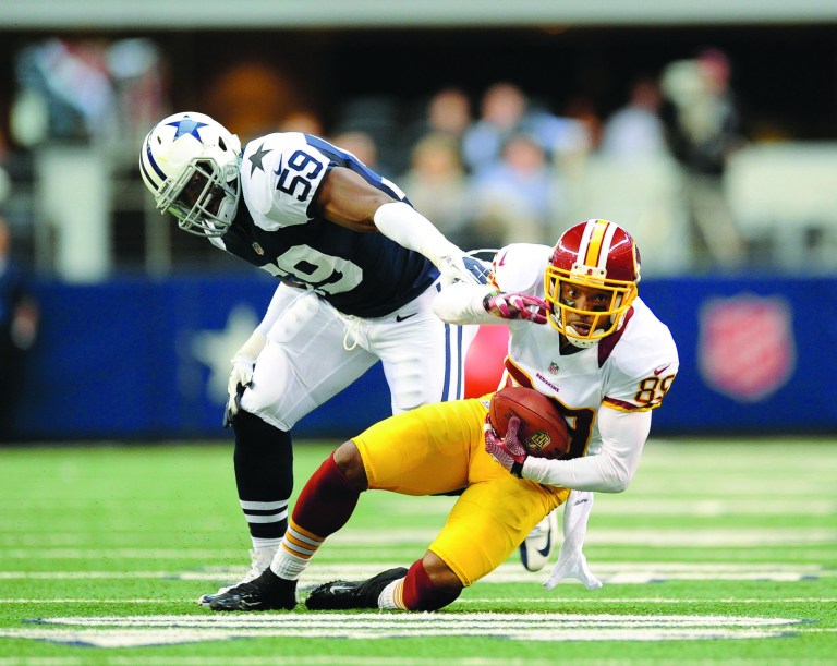 Matt Strasen/AP
Santana Moss and the Redskins face Ernie Sims and the Cowboys for the NFC East title in the regular-season finale on Sunday.