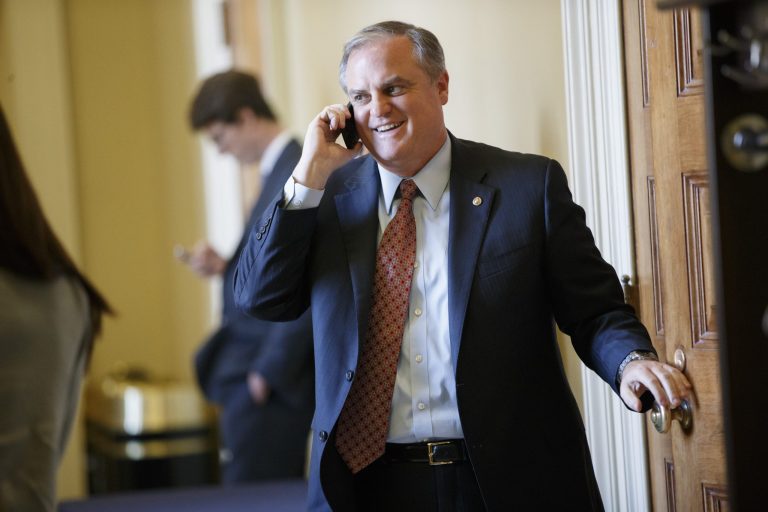 Sen. Mark Pryor, D-Ark., and members of the Democratic caucus file out of a strategy session on Capitol Hill in Washington, Tuesday, Nov. 18, 2014. (AP Photo/J. Scott Applewhite)