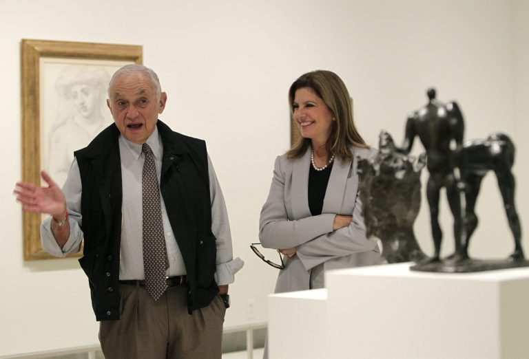 Retail mogul Leslie Wexner, left, and his wife Abigail tour the 